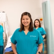 Smiling Nursing students in lab