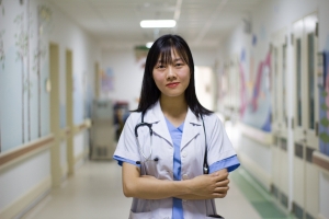 Young medical professional in a hallway