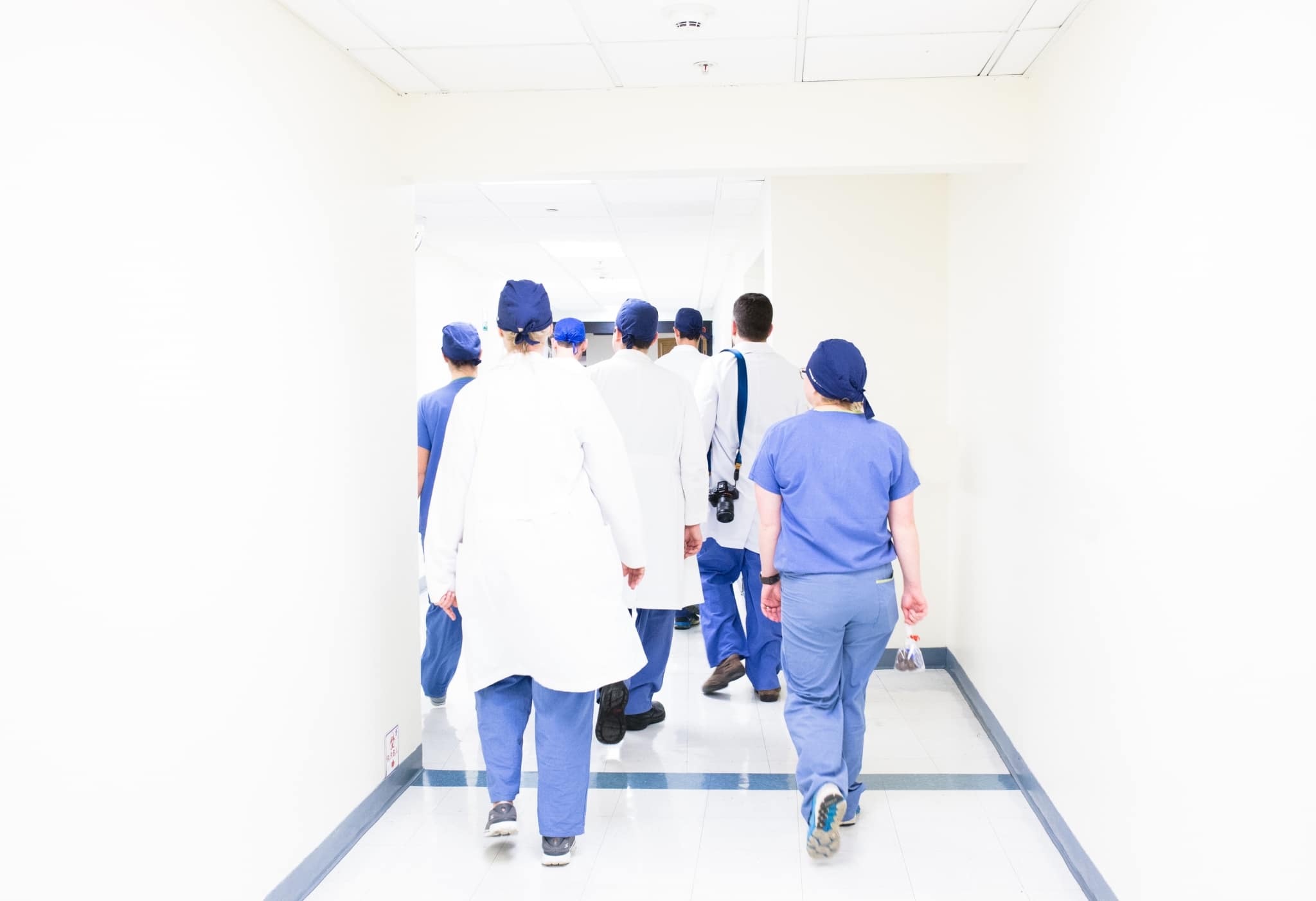 Healthcare professionals in a hallway
