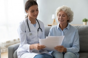 Legal Nurse Consultant helping an elderly patient