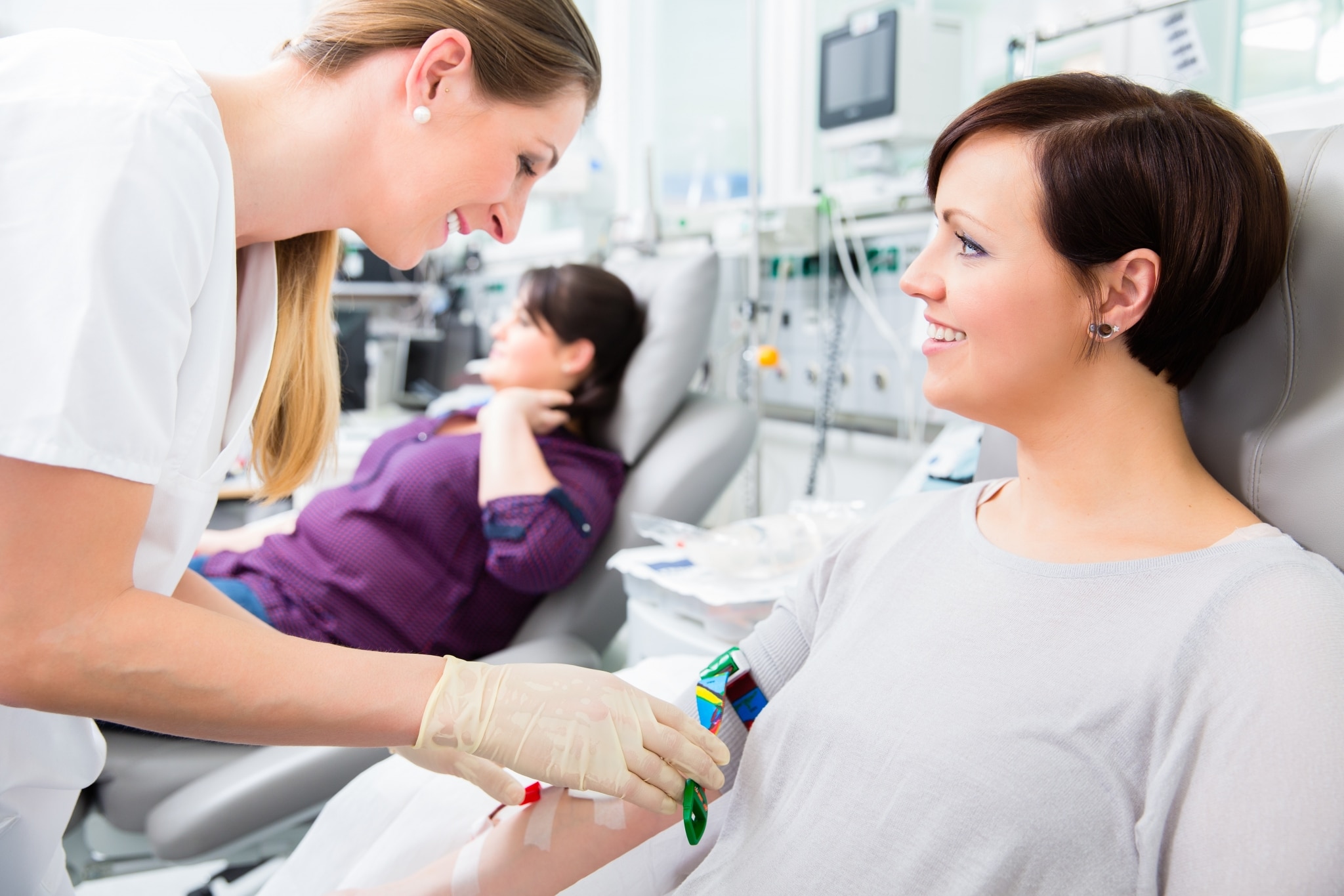 Phlebotomy Technician taking blood from a patient