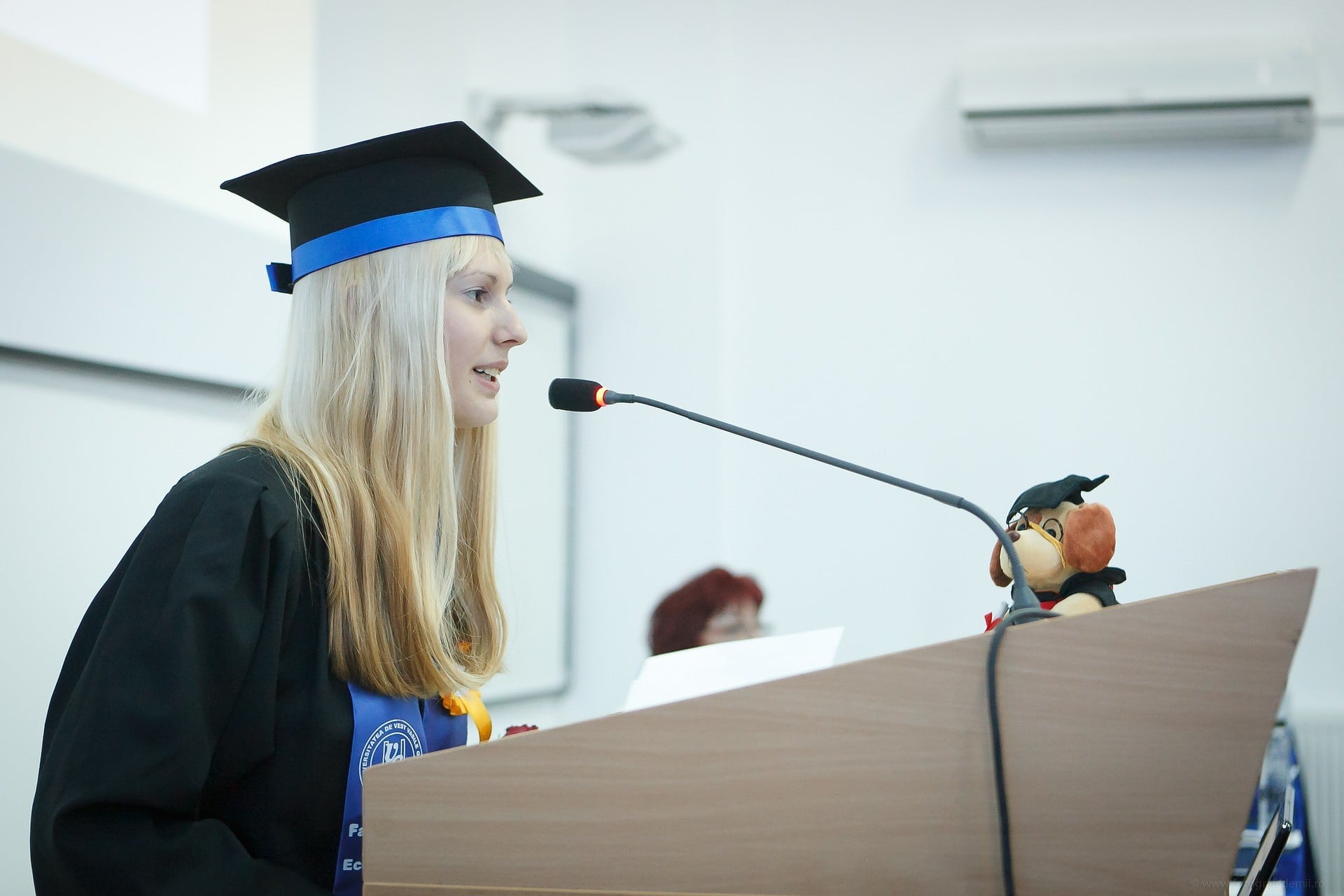 Graduate at a podium