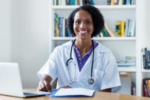 Africa-American nurse at a desk