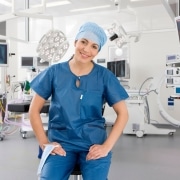 A smiling female surgeon
