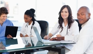 Medical team working at a conference table