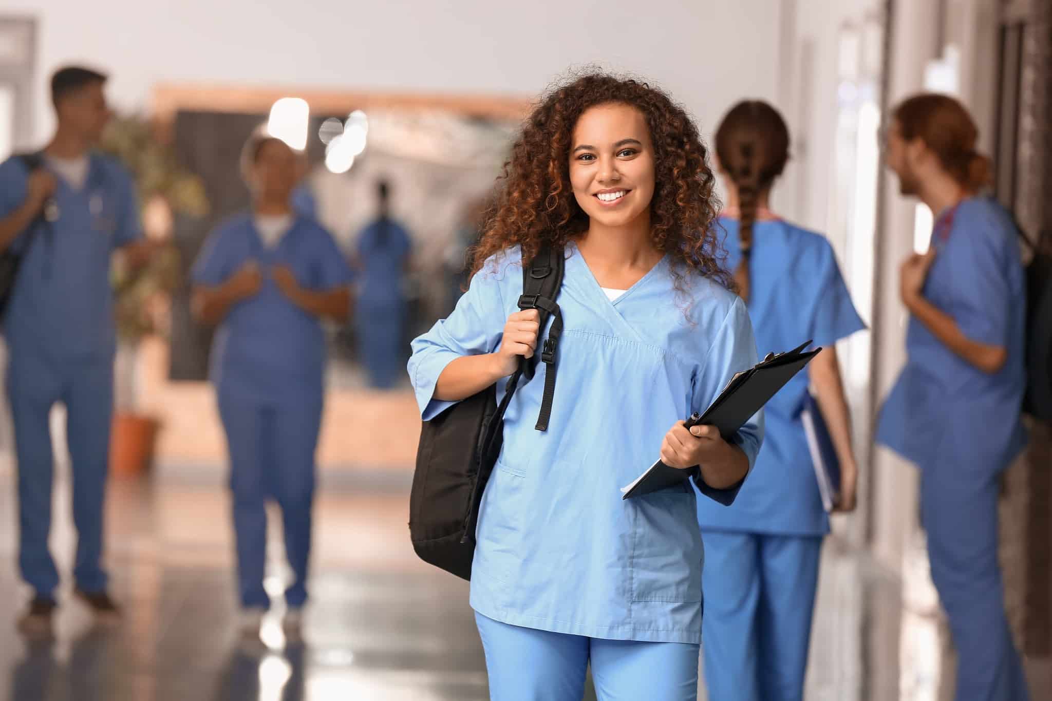 African-American medical student in a hallway