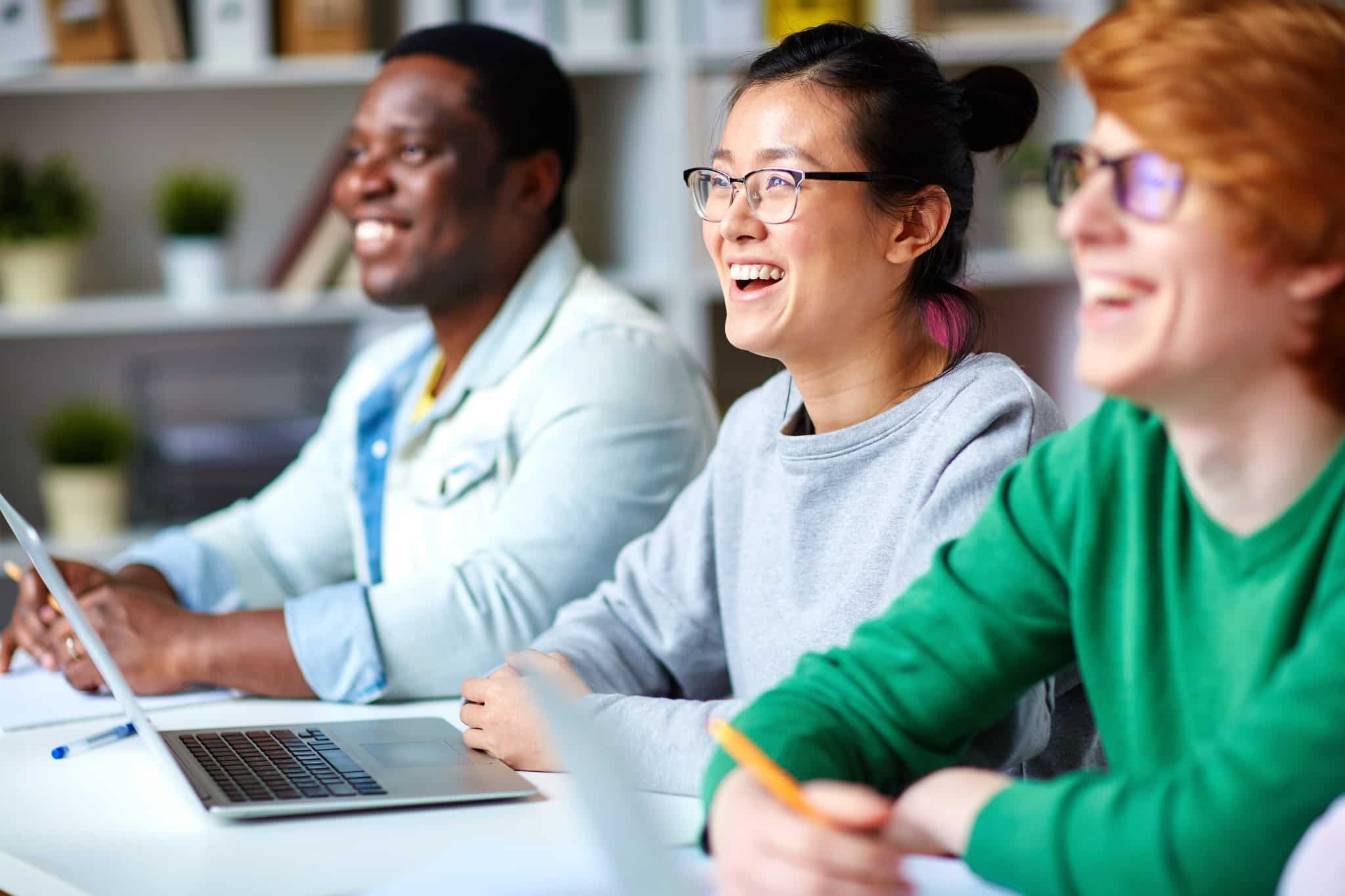 Students smiling at their instructor