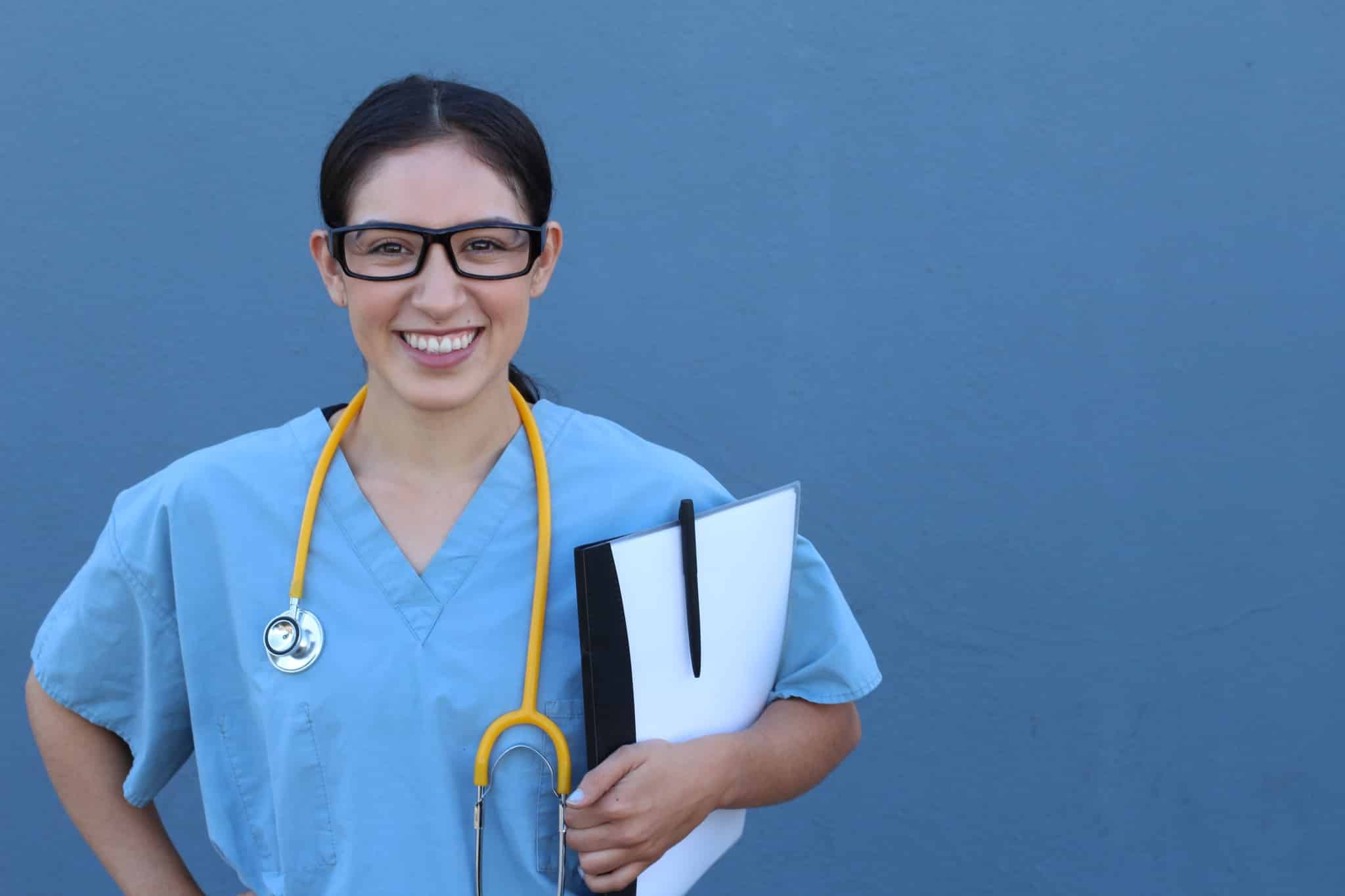 Smiling female healthcare professional with glasses