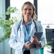 Attractive medical professional with clipboard