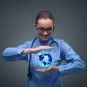 Travel nurse holding a virtual globe