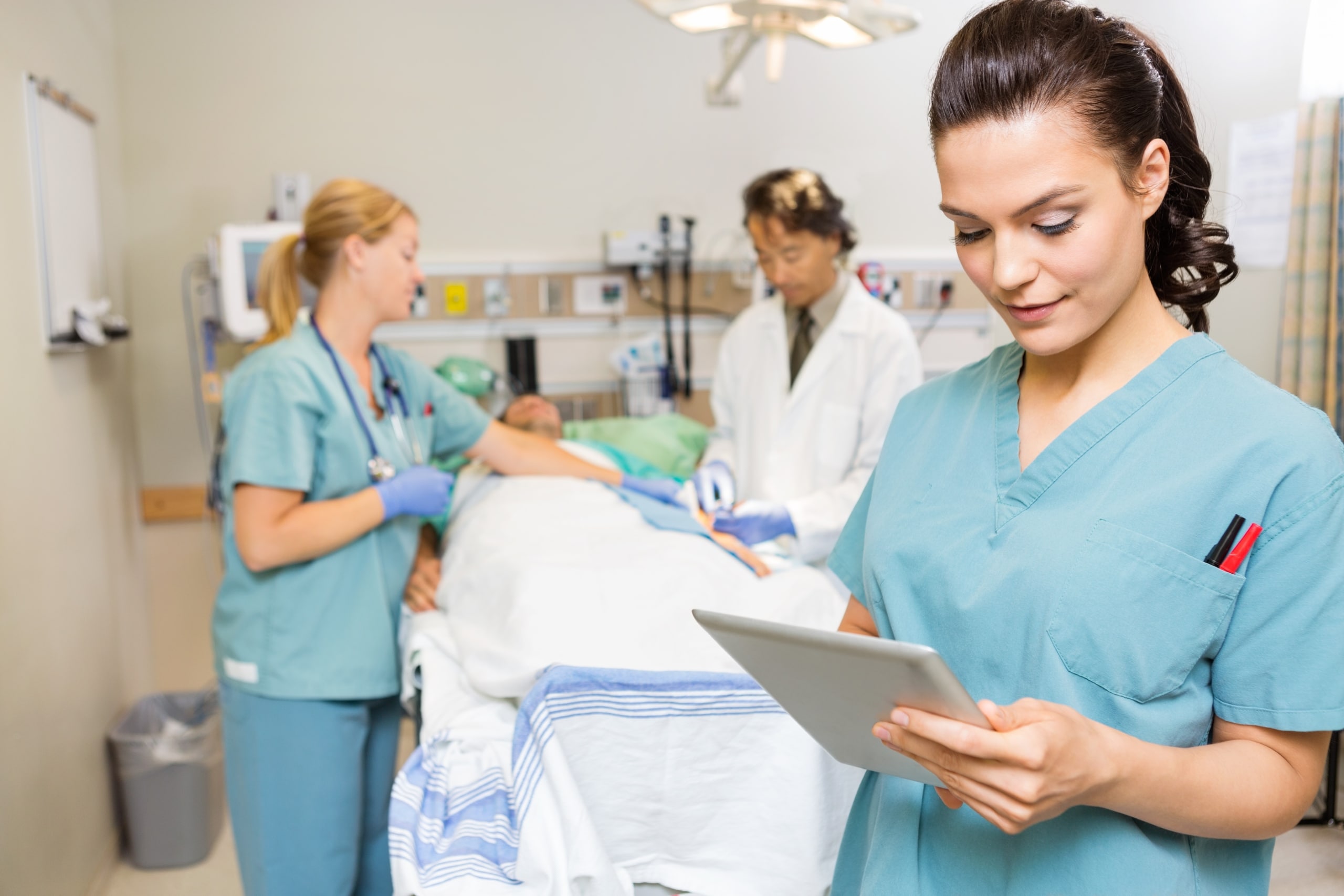 Medical professional team with a patient