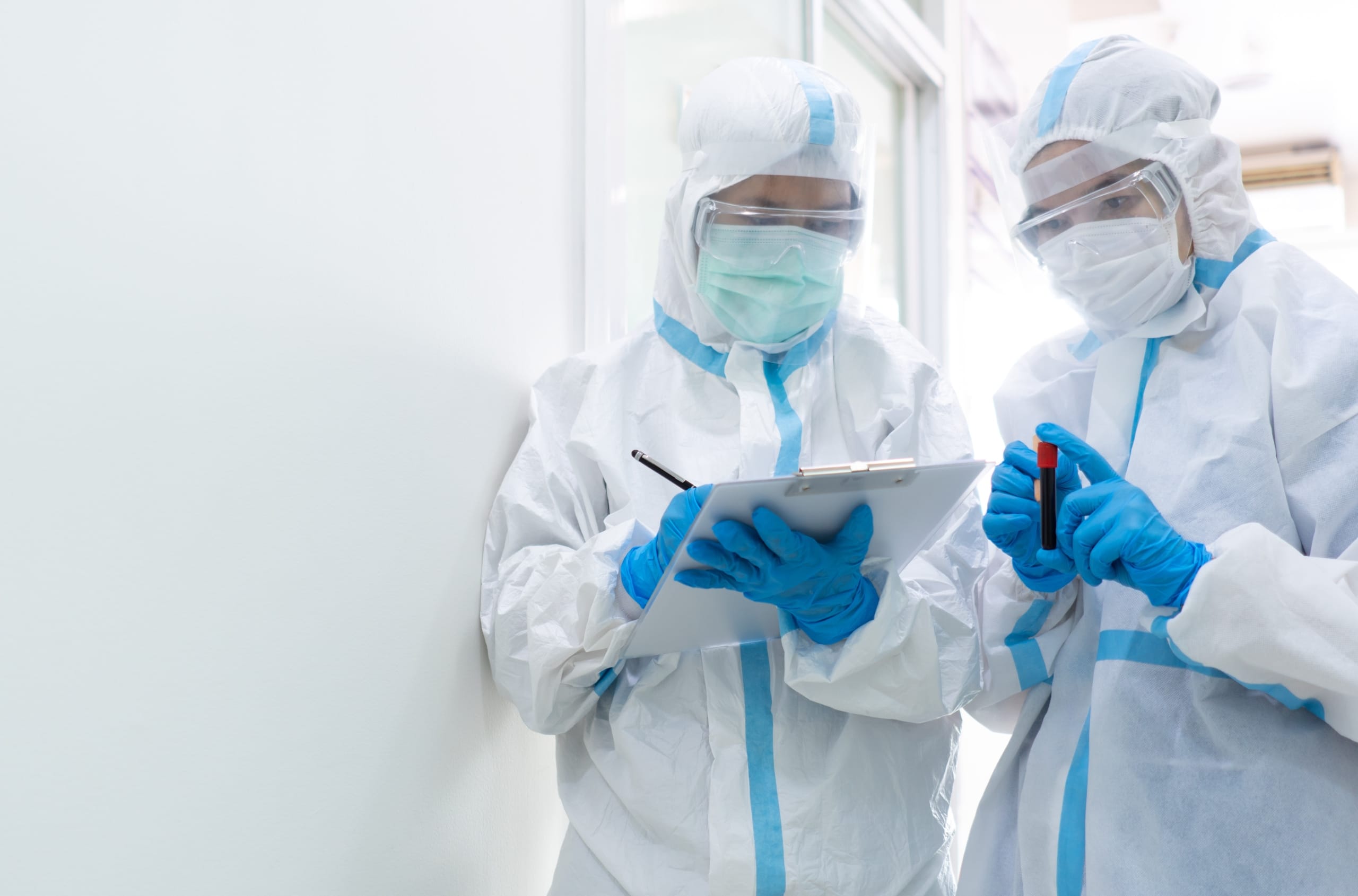 Medical professionals in protective gear