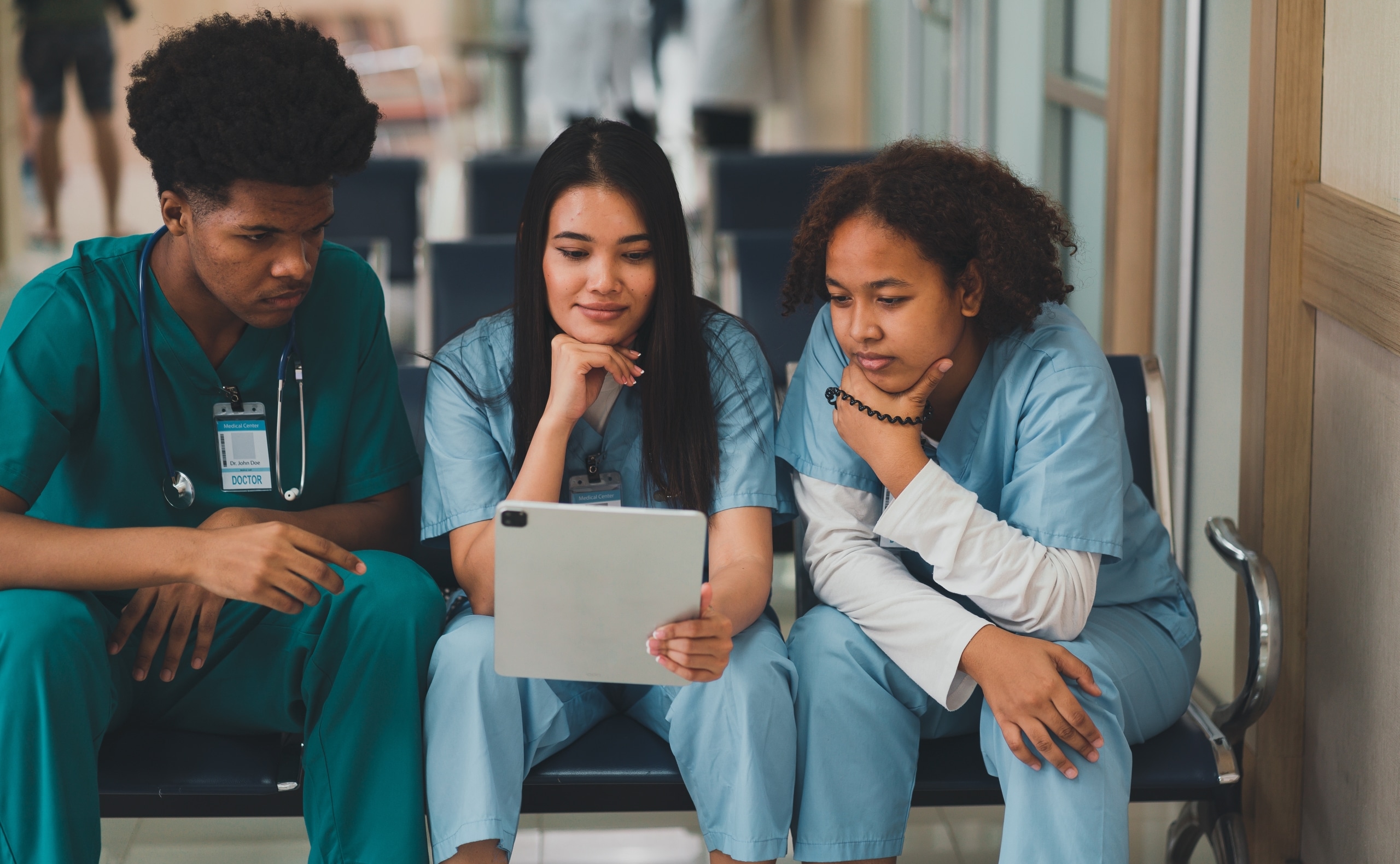 Medical professionals consulting a patient chart
