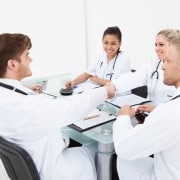Group of medical professionals at a conference table
