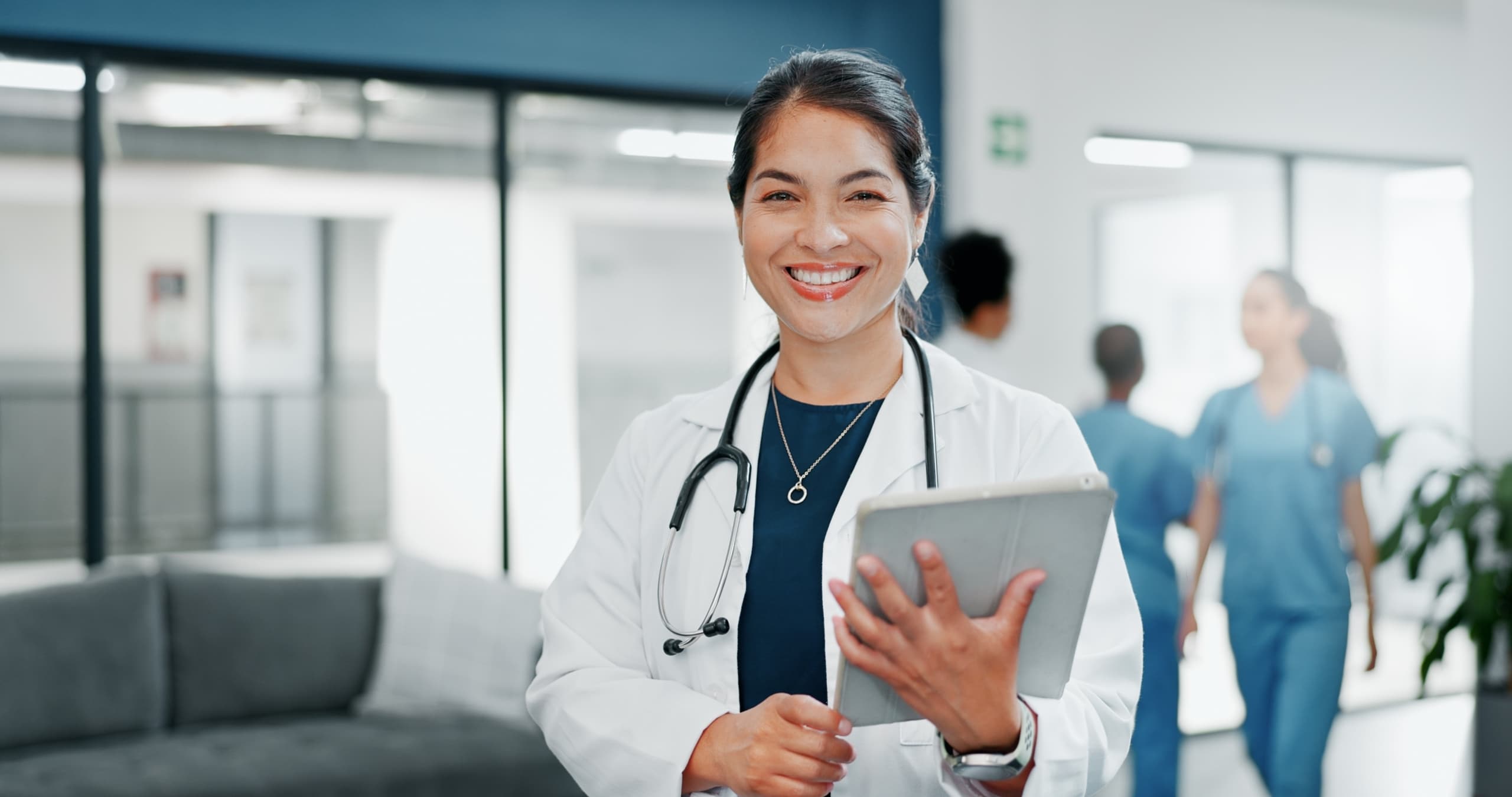 Female medical professional in a white lab coat