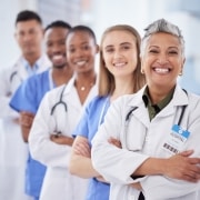 Group of diverse medical professionals standing in a line