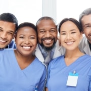 Diverse group of medical professionals smiling together