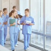 Group of medical professionals walking in a hospital hallway