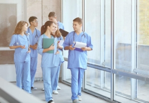 Group of medical professionals walking in a hospital hallway